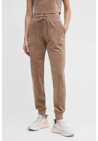 Guess - GUESS Brązowe damskie spodnie welurowe Couture, Rozmiar XS. Kolor: brązowy. Materiał: welur #1