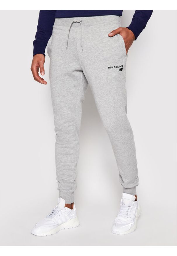Spodnie dresowe New Balance. Kolor: szary. Materiał: dresówka, syntetyk