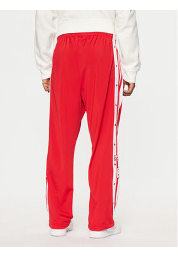 Adidas - adidas Spodnie dresowe Adibreak JP3765 Czerwony Regular Fit. Kolor: czerwony. Materiał: syntetyk