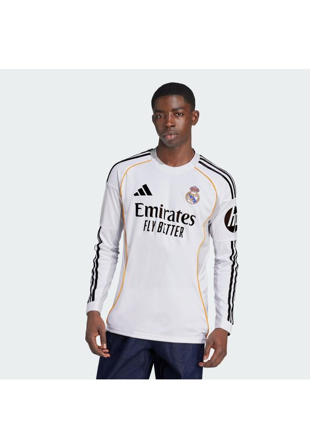 Adidas - Koszulka domowa z długim rękawem Real Madryt 25/26. Kolor: biały. Długość rękawa: długi rękaw. Długość: długie. Sport: piłka nożna