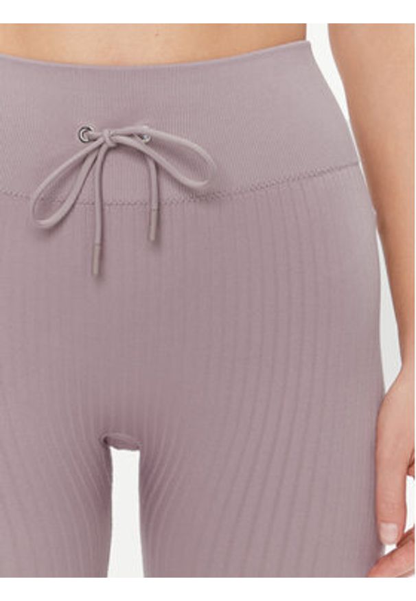 Guess Legginsy Rib-Seamless V4RB00 Z3CC0 Fioletowy Slim Fit. Kolor: fioletowy. Materiał: syntetyk