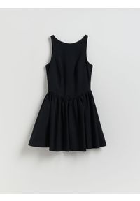 Reserved - Sukienka z kokardą - czarny. Typ kołnierza: kokarda. Kolor: czarny. Materiał: dzianina #1