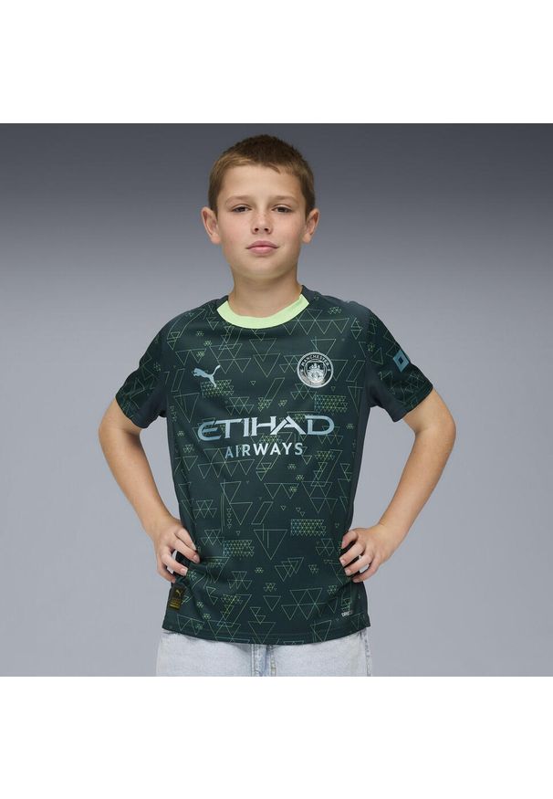 Puma - Młodzieżowa czwarta koszulka Manchester City 25/26 PUMA. Kolor: zielony. Sport: piłka nożna