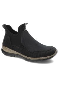 Czarne Botki Rieker Modne Wsuwane Obuwie Damskie. Okazja: na co dzień, na spacer. Zapięcie: bez zapięcia. Kolor: czarny. Materiał: materiał. Wzór: aplikacja. Styl: casual #1