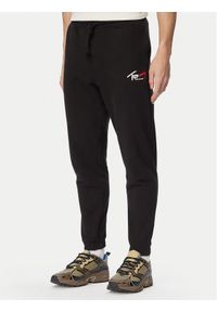 Tommy Jeans Spodnie dresowe DM0DM23903 Czarny Regular Fit. Kolor: czarny. Materiał: bawełna #1