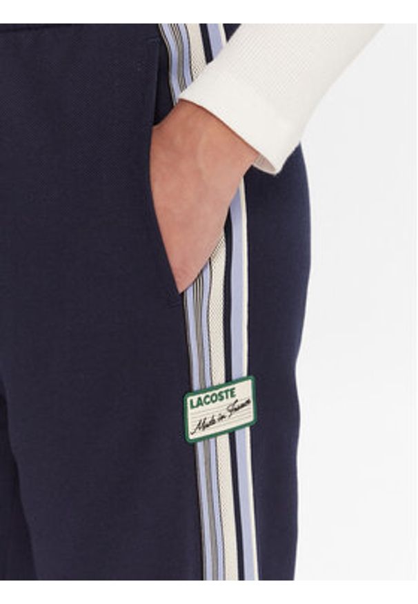 Lacoste Spodnie dresowe XF5250 Granatowy Regular Fit. Kolor: niebieski. Materiał: dresówka
