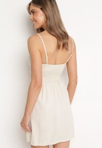 Born2be - Beżowa Sukienka Unneeded. Okazja: na randkę, na imprezę. Kolor: beżowy. Długość rękawa: na ramiączkach. Wzór: aplikacja. Typ sukienki: rozkloszowane. Styl: wakacyjny. Długość: mini #5