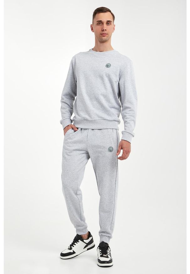 Plein Sport - Spodnie dresowe męskie PLEIN SPORT. Materiał: dresówka. Styl: sportowy