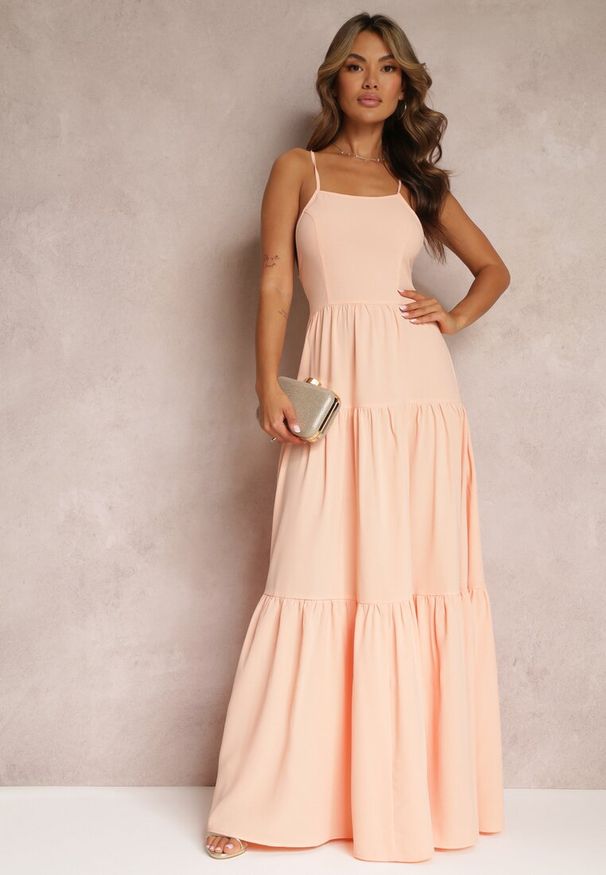 Renee - Pomarańczowa Rozkloszowana Maxi Sukienka z Falbankami i Wiązaniem na Tyle Karins. Typ kołnierza: kołnierz z falbankami. Kolor: pomarańczowy. Materiał: dzianina. Długość rękawa: na ramiączkach. Wzór: aplikacja, gładki. Długość: maxi