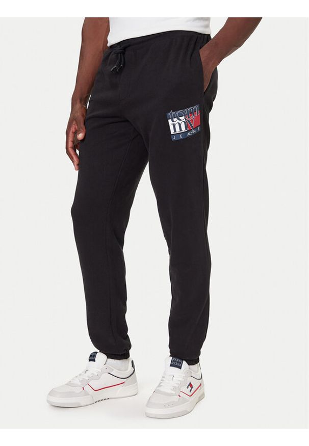 Tommy Jeans Spodnie dresowe DM0DM22094 Czarny Relaxed Fit. Kolor: czarny. Materiał: bawełna