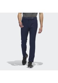 Adidas - Ultimate365 Tapered Pants. Kolor: niebieski. Materiał: materiał. Sport: golf #1