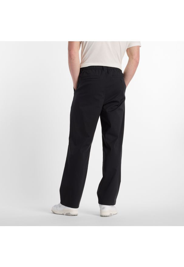 Spodnie męskie New Balance MP51563BK – czarne. Kolor: czarny. Materiał: bawełna, materiał, nylon