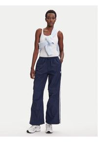 Adidas - adidas Spodnie dresowe 3-Stripes JD3127 Granatowy Loose Fit. Kolor: niebieski. Materiał: syntetyk #4
