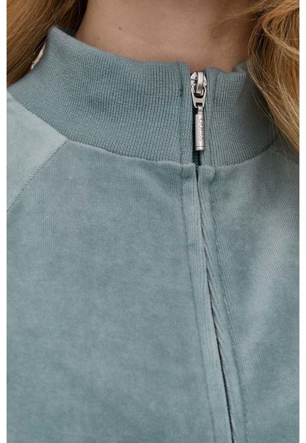 Guess bluza damska kolor zielony gładka. Okazja: na co dzień. Kolor: zielony. Materiał: dzianina. Długość rękawa: raglanowy rękaw. Wzór: gładki. Styl: casual