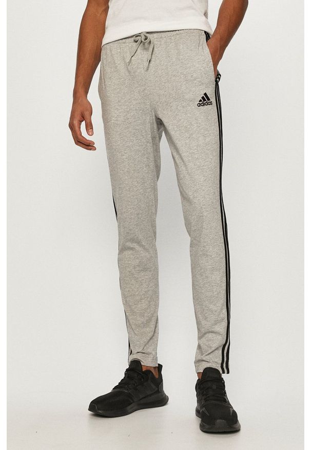 Adidas - adidas - Spodnie. Kolor: szary. Materiał: dzianina