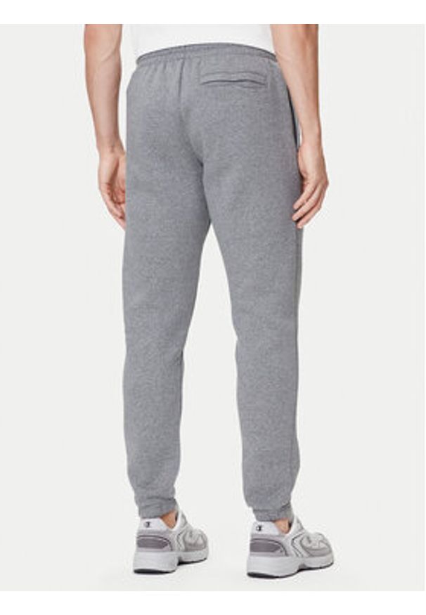 Under Armour Spodnie dresowe UA Essential Fleece Jogger 1373882 Szary Regular Fit. Kolor: szary. Materiał: bawełna