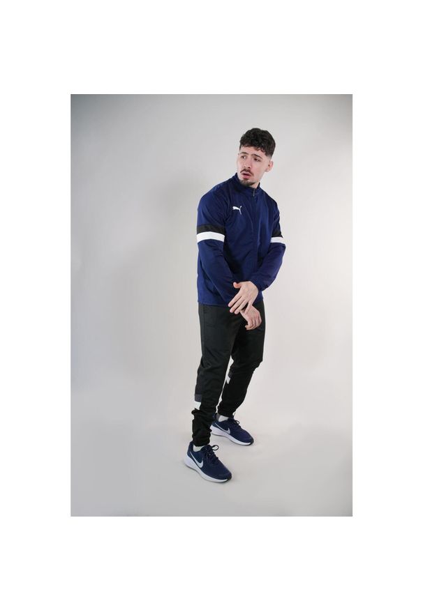 Dres męski Puma Team Rise. Kolor: biały, wielokolorowy, niebieski, czarny. Materiał: dresówka