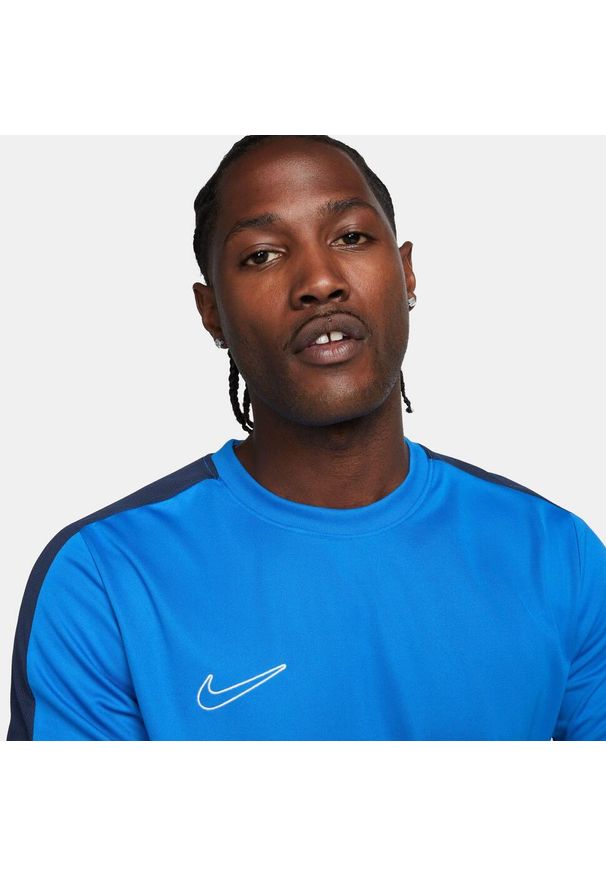 Koszulka treningowa męska Nike DF Academy 23. Kolor: niebieski. Materiał: poliester. Długość rękawa: krótki rękaw. Długość: krótkie