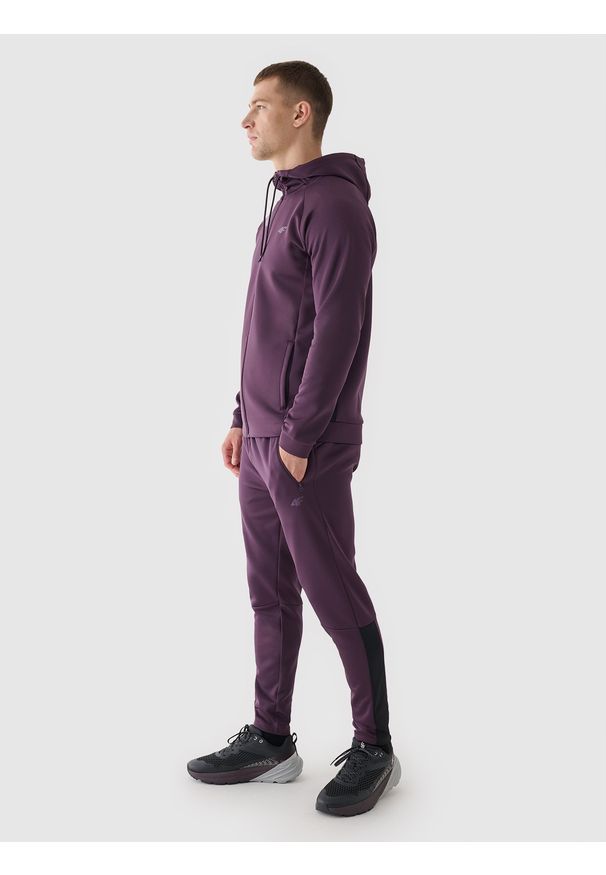 4f - 4F Spodnie treningowe szybkoschnące męskie - fioletowe L. Kolor: fioletowy. Materiał: syntetyk, włókno, dzianina, materiał, elastan. Wzór: jednolity, ze splotem. Sport: fitness