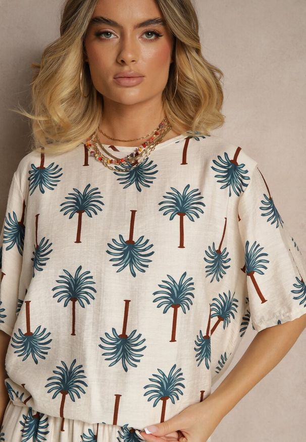 Renee - Niebieski Komplet z Wiskozy Zdobiony Printem w Palmy Szerokie Spodnie i T-shirt Zioleana. Kolor: niebieski. Materiał: wiskoza. Wzór: nadruk, aplikacja