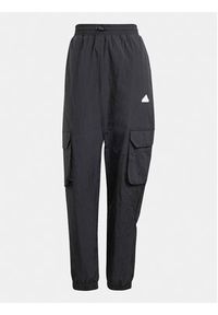 Adidas - adidas Spodnie dresowe City Escape IQ4826 Czarny Loose Fit. Kolor: czarny. Materiał: syntetyk #3
