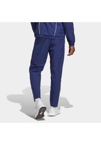 Spodnie Adidas Włochy Figc Pre Pnt Dorosłych. Kolor: niebieski. Materiał: poliamid