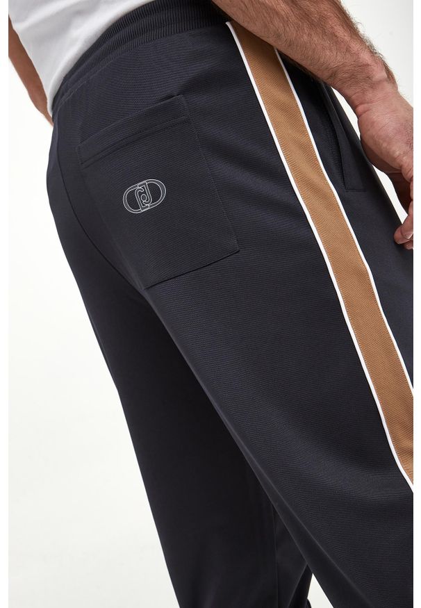 Liu Jo - Spodnie dresowe męskie LIU JO. Materiał: dresówka