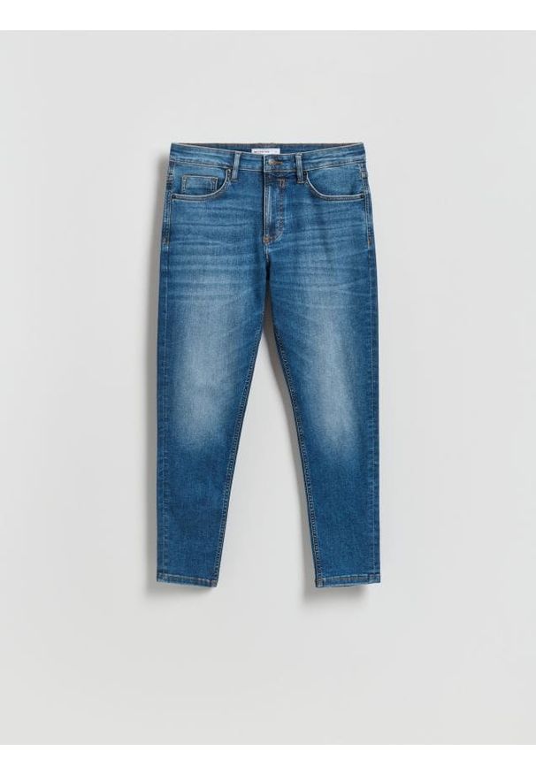 Reserved - Jeansy skinny z efektem sprania - niebieski. Kolor: niebieski