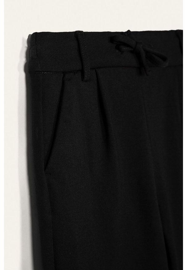 Kids Only - Spodnie dziecięce 116-164 cm. Okazja: na co dzień. Kolor: czarny. Materiał: dzianina. Wzór: gładki. Styl: casual