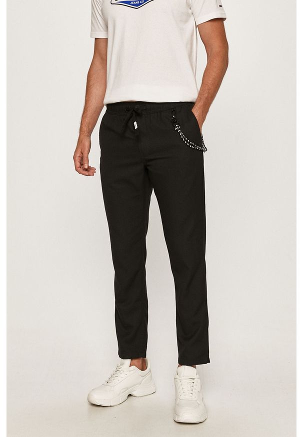 Tommy Jeans - Spodnie. Kolor: czarny. Materiał: tkanina, poliester, wiskoza. Wzór: gładki
