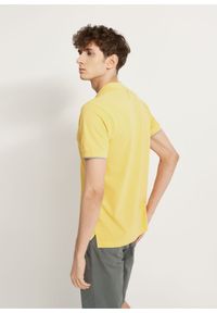 Ochnik - Żółta koszulka polo. Typ kołnierza: polo. Kolor: żółty. Materiał: bawełna. Długość rękawa: krótki rękaw. Długość: krótkie
