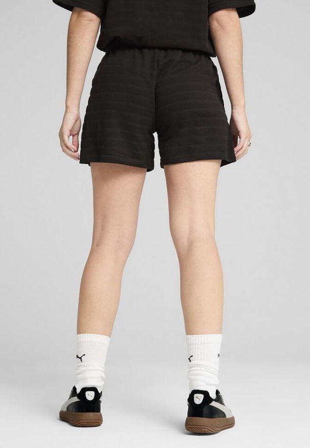 Puma - Damskie strukturalne szorty ESS ELEVATED 5" z wysokim stanem PUMA Black. Stan: podwyższony. Kolor: czarny
