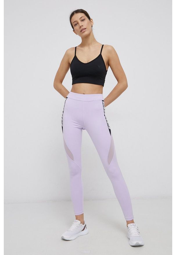 Guess - Legginsy. Kolor: fioletowy. Materiał: skóra, dzianina. Wzór: nadruk
