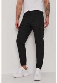 Selected Spodnie męskie kolor czarny joggery. Okazja: na co dzień. Kolor: czarny. Materiał: tkanina. Wzór: gładki. Styl: casual #1