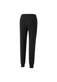 Puma - Spodnie Do Joggingu Damskie Metalik ESS+. Kolor: czarny. Materiał: dresówka. Sport: bieganie