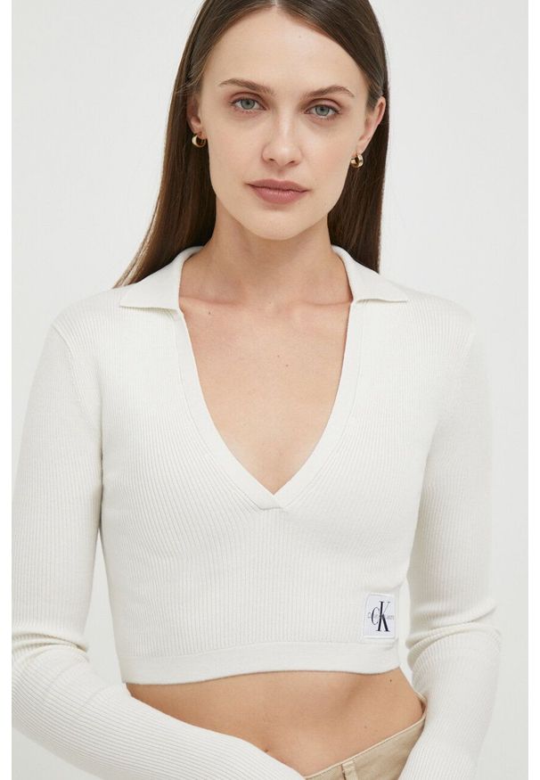 Calvin Klein Jeans longsleeve damski kolor beżowy. Kolor: beżowy. Materiał: dzianina, prążkowany. Długość rękawa: długi rękaw. Długość: długie