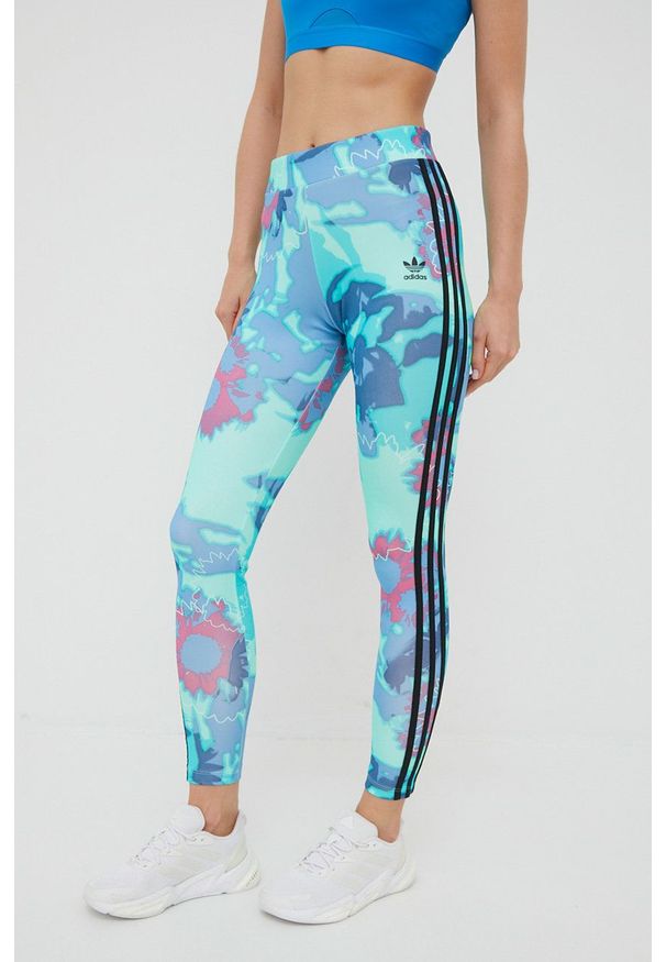 adidas Originals legginsy HC4588 damskie kolor turkusowy z nadrukiem. Kolor: turkusowy. Materiał: dzianina, materiał. Wzór: nadruk