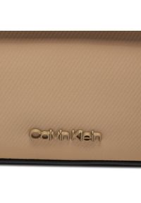 Calvin Klein Saszetka Ck Origami Camera Bag K50K511900 Beżowy. Kolor: beżowy. Materiał: materiał