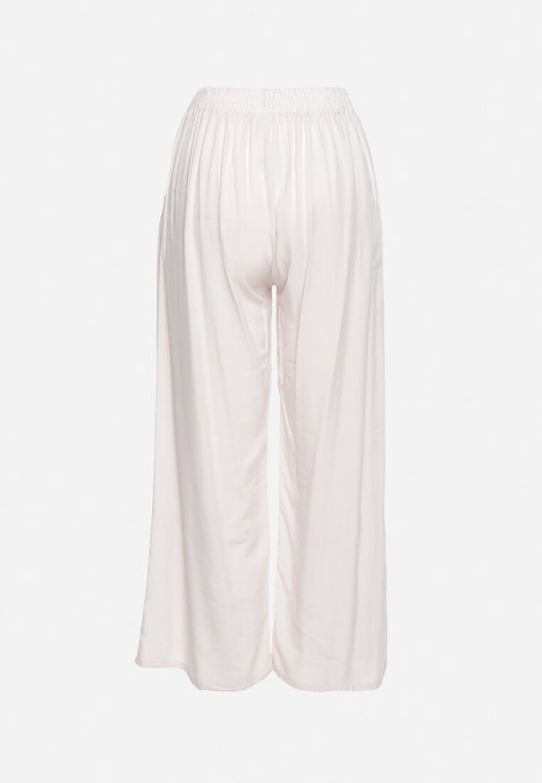 Born2be - Jasnobeżowe Bawełniane Spodnie z Szerokimi Nogawkami Palazzo z Gumką w Pasie Nesira. Okazja: na spacer, na co dzień. Kolor: beżowy. Materiał: bawełna. Styl: boho, casual