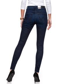 Wrangler - WRANGLER SUPER HIGH SKINNY TAINTED BLUE W27WSZ21H. Stan: podwyższony. Wzór: jednolity #3