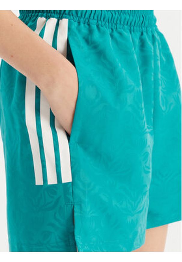 Adidas - adidas Szorty sportowe Tiro x Common Goal JL9208 Turkusowy Loose Fit. Kolor: turkusowy. Materiał: syntetyk