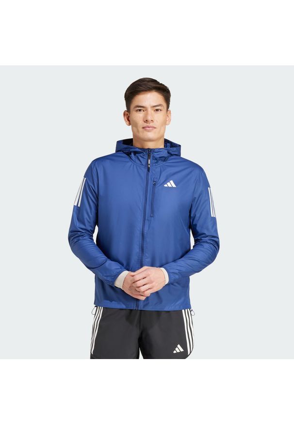 Adidas - Kurtka Own The Run. Kolor: niebieski. Sport: bieganie
