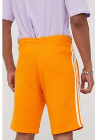 adidas Originals szorty bawełniane Adicolor męskie kolor pomarańczowy. Kolor: pomarańczowy. Materiał: bawełna #2