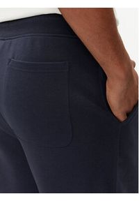 GANT - Gant Spodnie dresowe Shield 2009026 Granatowy Regular Fit. Kolor: niebieski. Materiał: bawełna #5