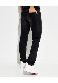 Balmain - BALMAIN - Czarne spodnie jeansowe z logo. Kolor: czarny. Długość: długie. Styl: klasyczny