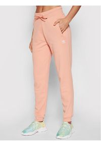 Adidas - adidas Spodnie dresowe adicolor Essentials H37874 Różowy Slim Fit. Kolor: różowy. Materiał: bawełna, dresówka #1