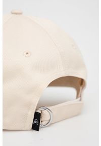 Calvin Klein Jeans czapka bawełniana kolor beżowy z nadrukiem. Kolor: beżowy. Materiał: bawełna. Wzór: nadruk