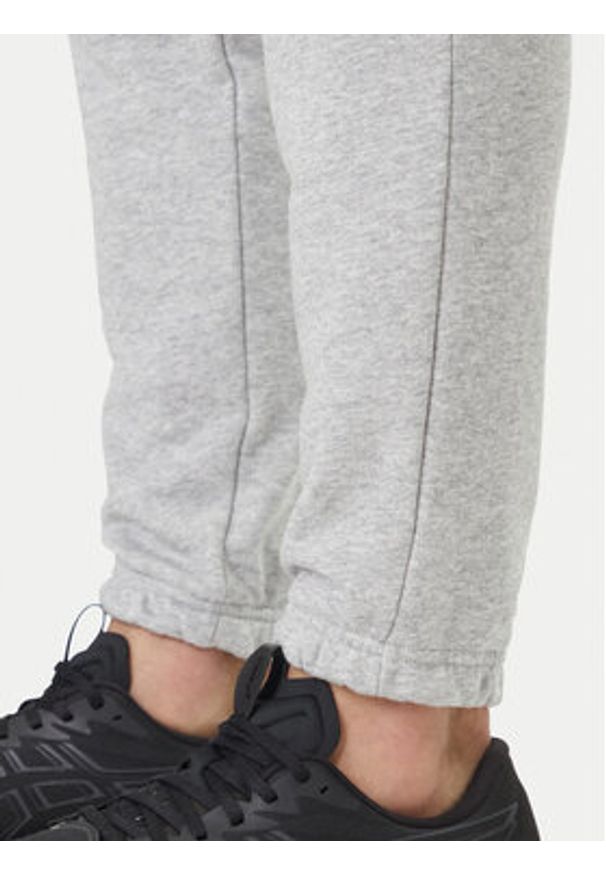 Under Armour Spodnie dresowe UA Rival 6014638 Szary Regular Fit. Kolor: szary. Materiał: bawełna