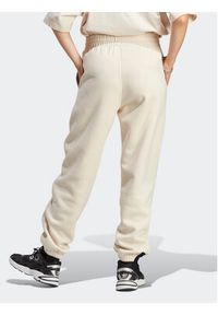 Adidas - adidas Spodnie dresowe Essentials Fleece IA6436 Écru Regular Fit. Materiał: bawełna #4