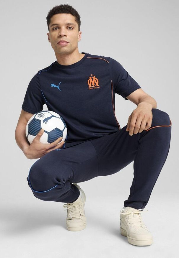 Puma - Męska koszulka Casuals Olympique Marsylia PUMA. Kolor: pomarańczowy, wielokolorowy, niebieski, żółty